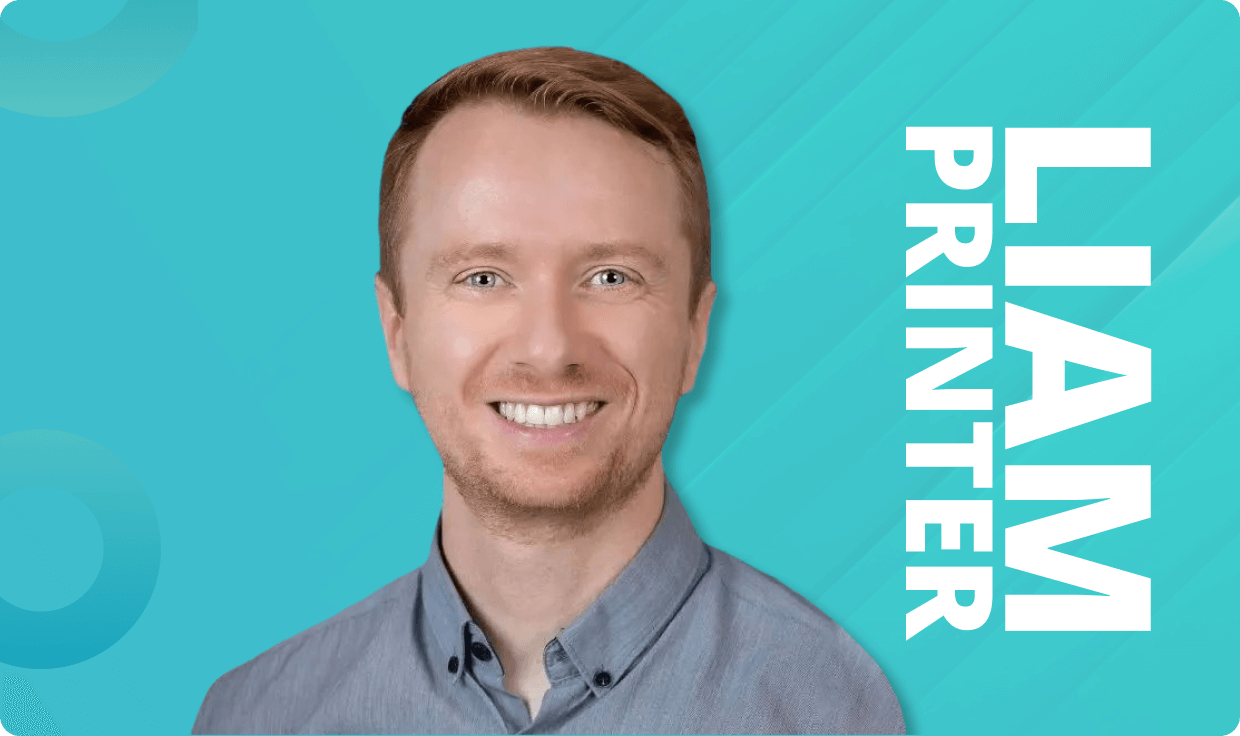 man smiling with name initials on one side